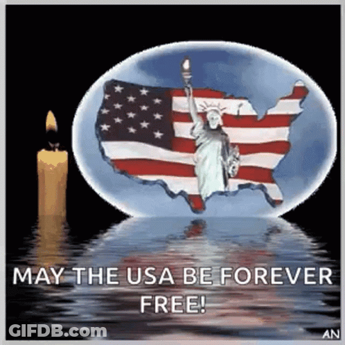 Statue Of Liberty In Snow Globe With American Flag And Candle GIF