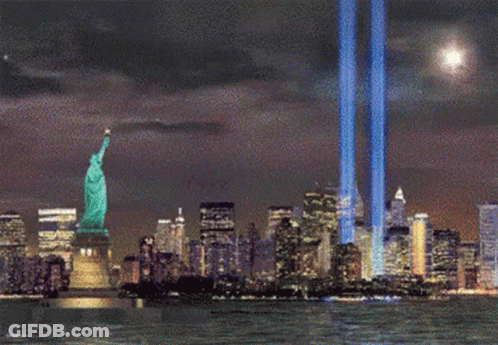 Statue Of Liberty Lit Up At Night GIF