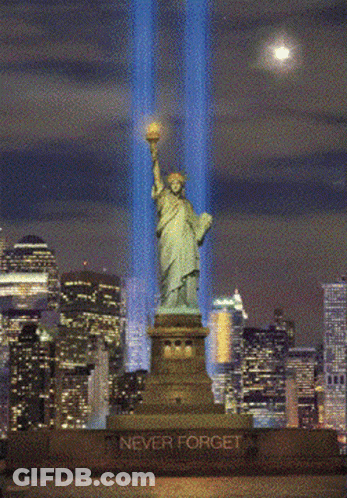 Statue Of Liberty Lit Up Saying Never Forget GIF