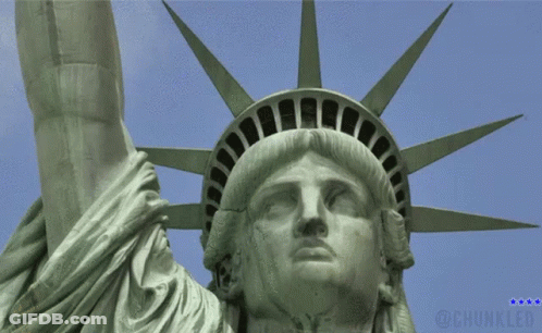 Statue Of Liberty With Pig Behind It GIF