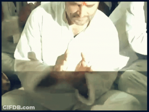Statue Of Man Holding Shield And Two Cannons Graphic Designer Rahul GIF