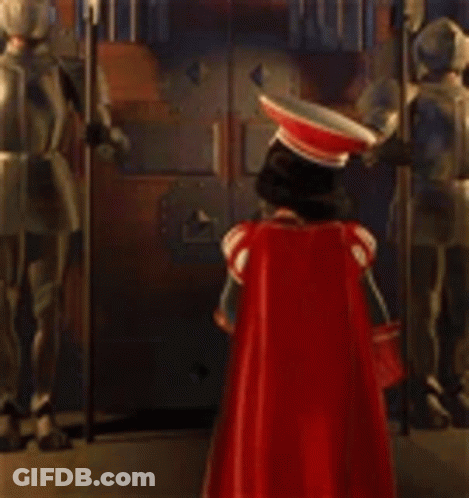 Statue Of Man In Red Cape At Door GIF
