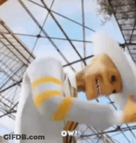 Statue Of Man In Striped Suit GIF