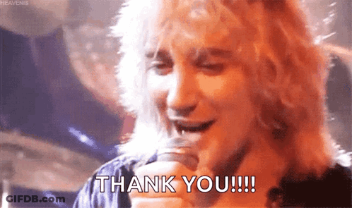 Statue Of Man In Tin Man Outfit GIF