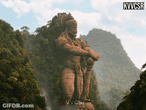 Statue Of Man On Mountain With Kvvcsr GIF