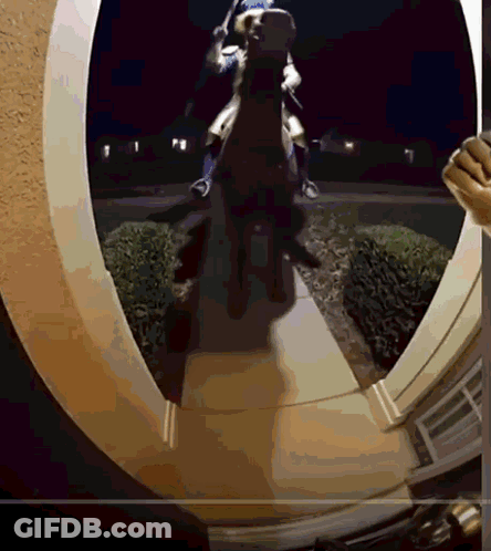 Statue Of Man Riding Horse In Front Of Door GIF