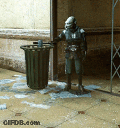Statue Of Man Standing Next To Trash Can GIF