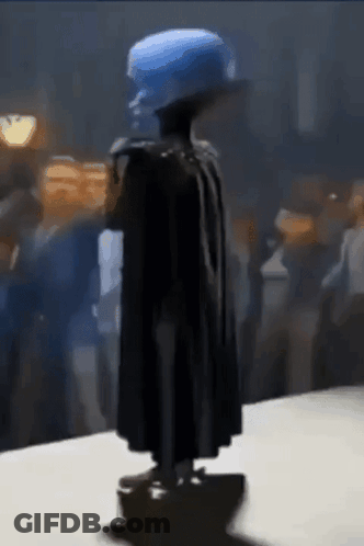 Statue Of Man With Blue Hat And Cape GIF
