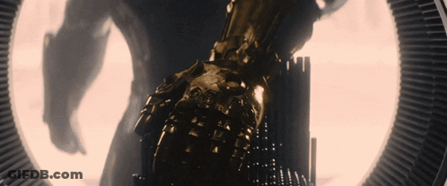 Statue Of Man With Glove On Arm GIF
