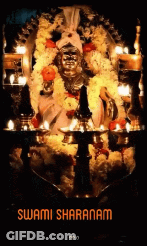 Statue Of Swami Sharanam With Candles GIF