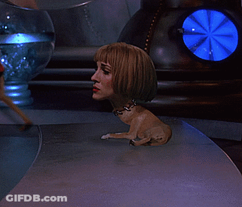 Statue Of Woman With Head On Dog's Back GIF