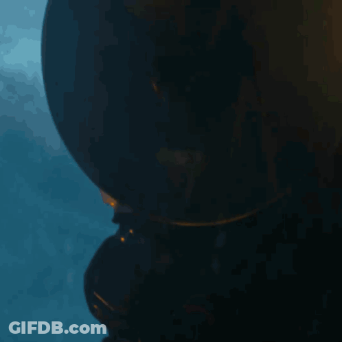 Statue With Blue Background And Flame GIF