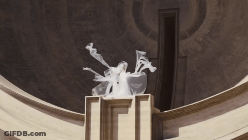 Statue With Smoke Coming Out On Pedestal GIF