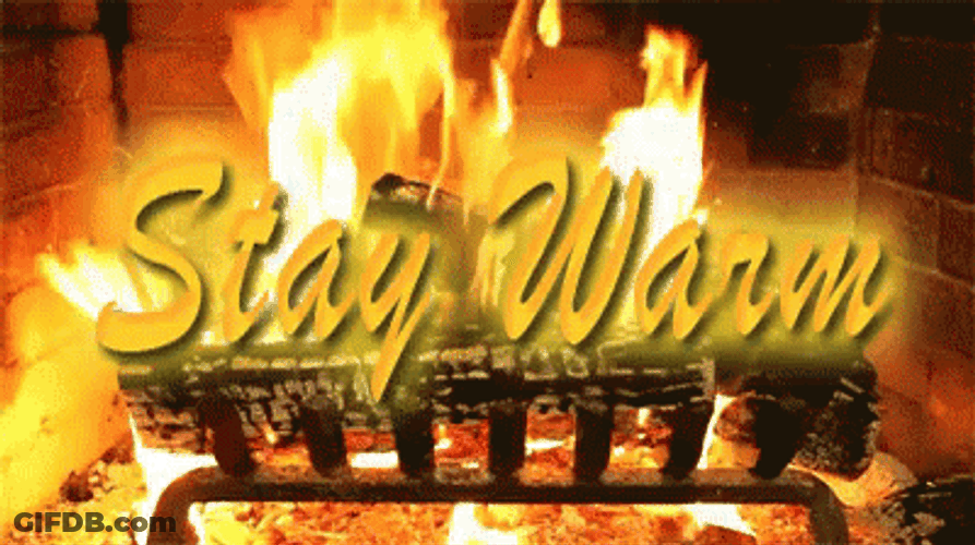 Stay Warm In This Fireplace GIF