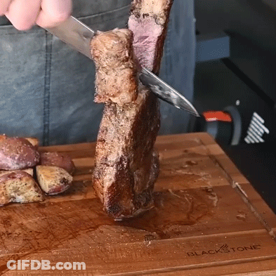 Steak Being Cut On Blackstone Board GIF