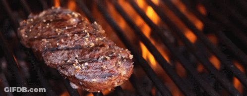Steak Cooking On Grill With Flames GIF