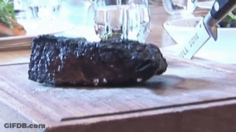 Steak Sliced On Cutting Board Knife Says Feel Done GIF