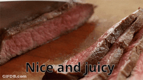 Steak Sliced On Wooden Board Saying Nice And Juicy GIF