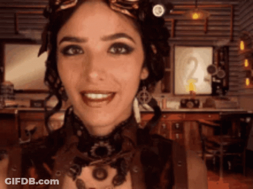 Steampunk Woman Smiling With Goggles GIF