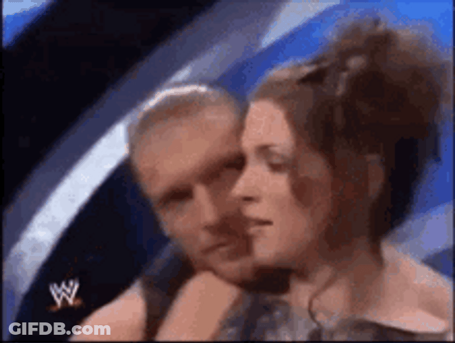 Stephanie Mcmahon Hugged By A Man GIF