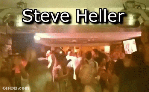 Steve Heller Sign Over Crowded Dance Floor GIF