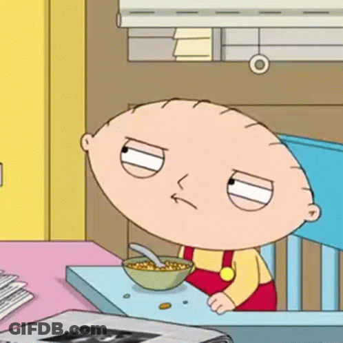 Stewie From Family Guy Is Sitting At A Table Eating Cereal . GIF
