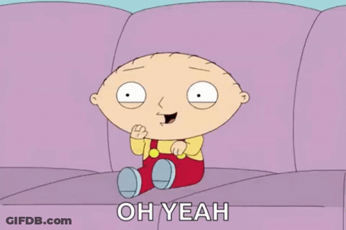 Stewie From Family Guy Is Sitting On A Purple Couch . GIF