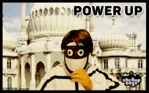Stickup Boys Poster Masked Man In Front Of Building GIF