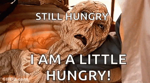 Still Hungry I Am A Little Hungry Written On A Picture Of A Mummy GIF