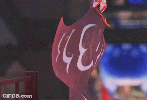 Stingray Statue With Fish On Head GIF