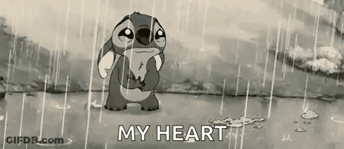 Stitch From Disney 'S Lilo And Stitch Is Crying In The Rain In A Black And White Cartoon . GIF