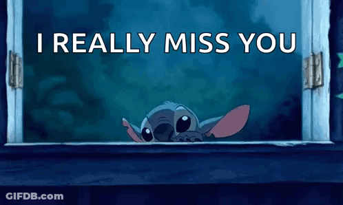Stitch From Disney 'S Lilo And Stitch Is Peeking Out Of A Window At Night . GIF
