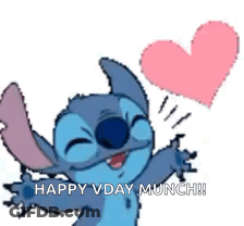 Stitch Holding Pink Heart Saying Happy Vday Munch GIF