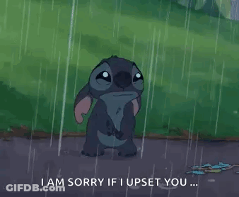 Stitch Is Standing In The Rain With A Sad Look On His Face . GIF