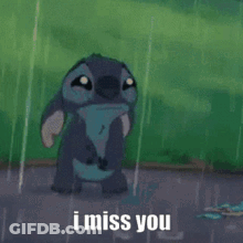 Stitch Lying In Rain Saying I Miss You GIF