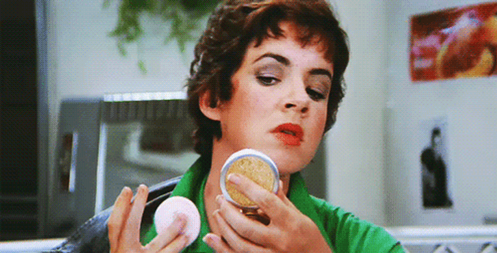 Stockard Channing Hiding Hickey Bites GIF