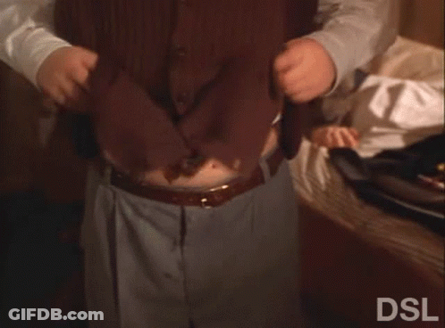 Stomach Covered In Coca Cola Cans GIF