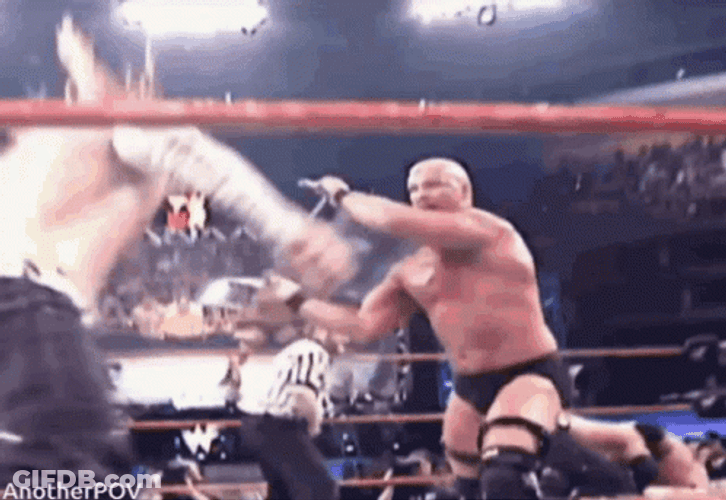 Stone Cold Steve Austin Hitting Jeff Hardy GIF
