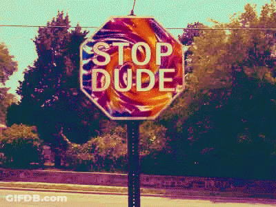 Stop Dude Sign With Lollipop GIF