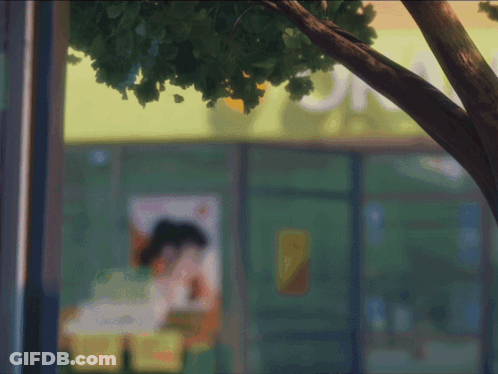Store Front With Tree And Yellow Sign GIF