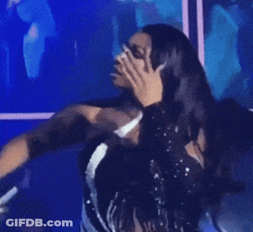 Store Worker In Glasses And Blue Vest Covering Mouth GIF