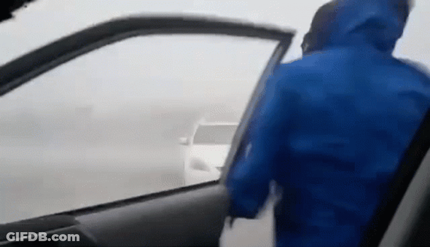 Storm Chaser Being Blown By Strong Wind GIF