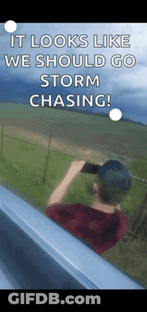 Storm Chaser Taking Videos In The Rain GIF
