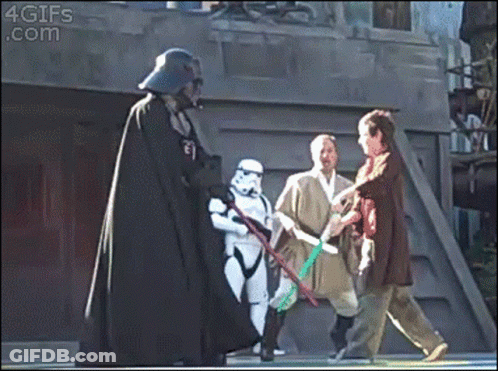 Storm Trooper Holding Green Lightsaber GIF
