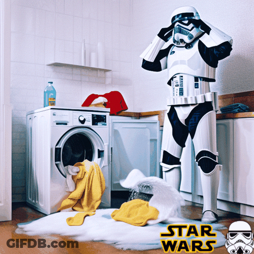 Storm Trooper Standing In Front Of A Washing Machine With Star Wars Written On The Bottom Right GIF