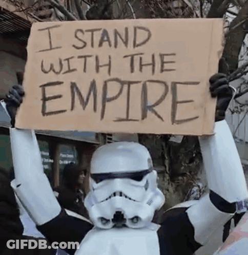Stormtrooper Holding Sign I Stand With The Empire GIF