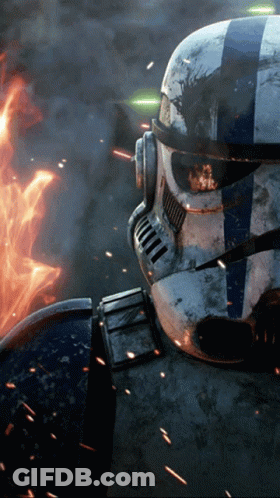 Stormtrooper Standing In Front Of Fire And Smoke GIF