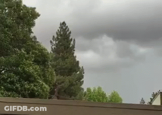 Stormy Sky With Trees And House GIF