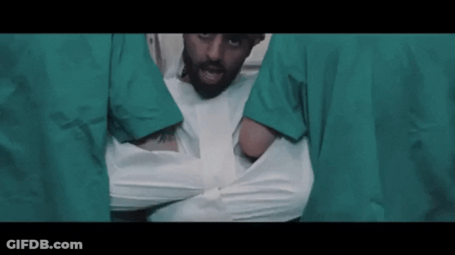 Straight Jacket Man Getting Dragged GIF
