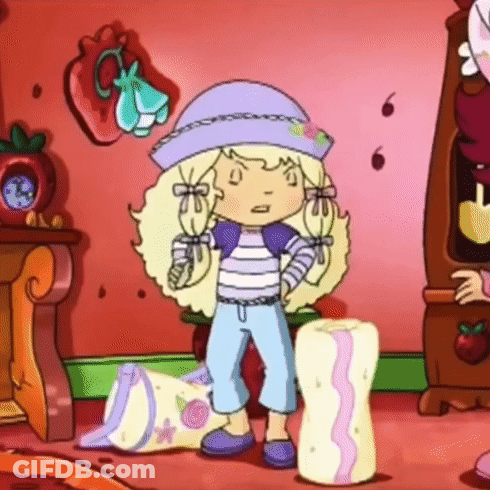 Strawberry Shortcake Standing Next To Pillow GIF